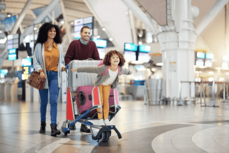 long-term family trips featured image mom and dad with daughter navigating airport